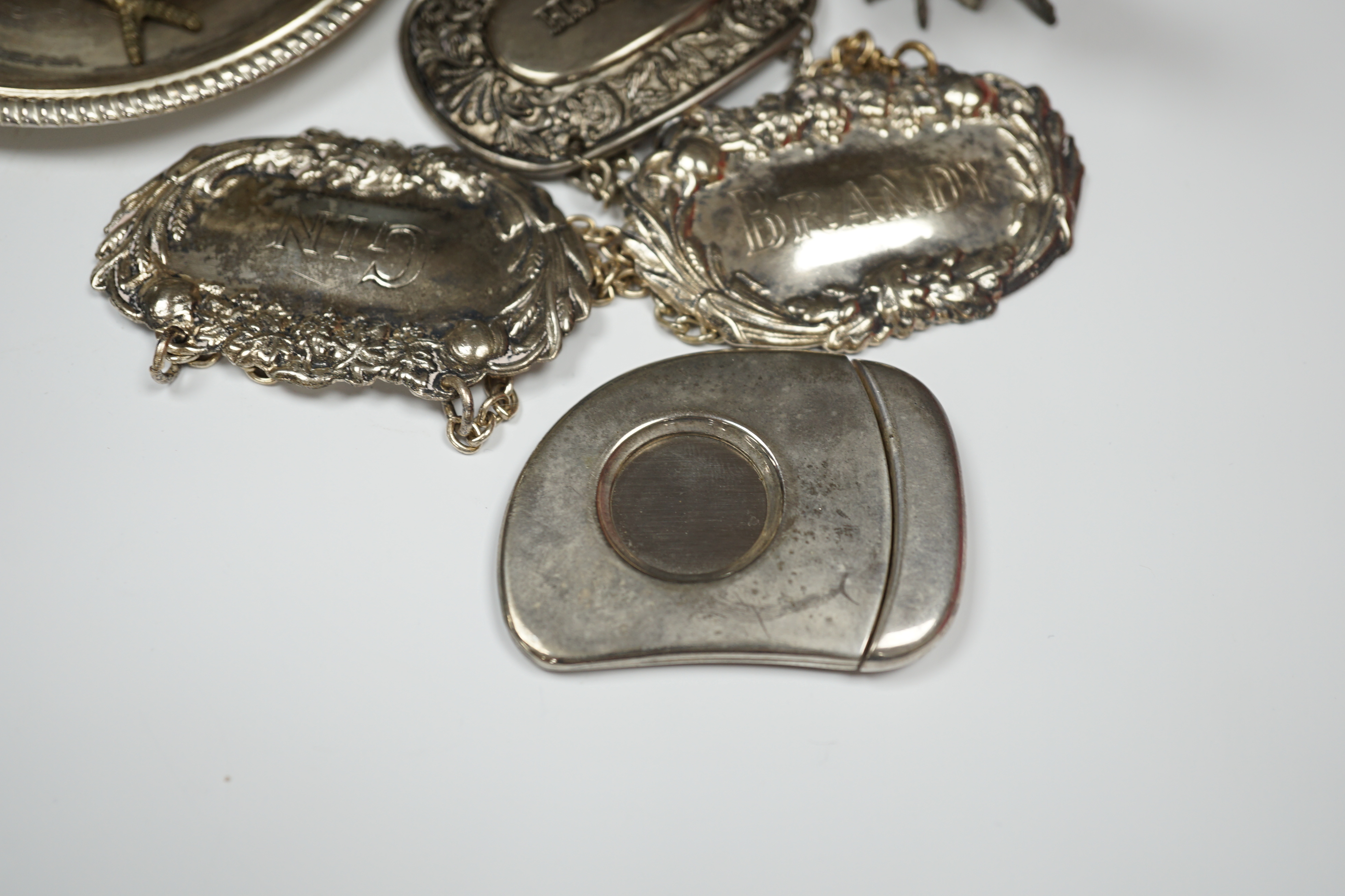 Mixed silver plate including cutlery, dishes, decanter labels and model pheasants